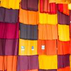 A store dedicated to Buddhist monks, displaying robes, Yangon, Myanmar, Indochina, South East Asia.