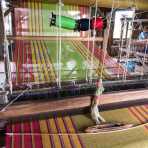 Weaving rare yarn from natural lotus fibers, to produce expensive scarves, Kyaing Kan Village, Inle Lake, Shan State, Myanmar, Indochina, South East Asia.