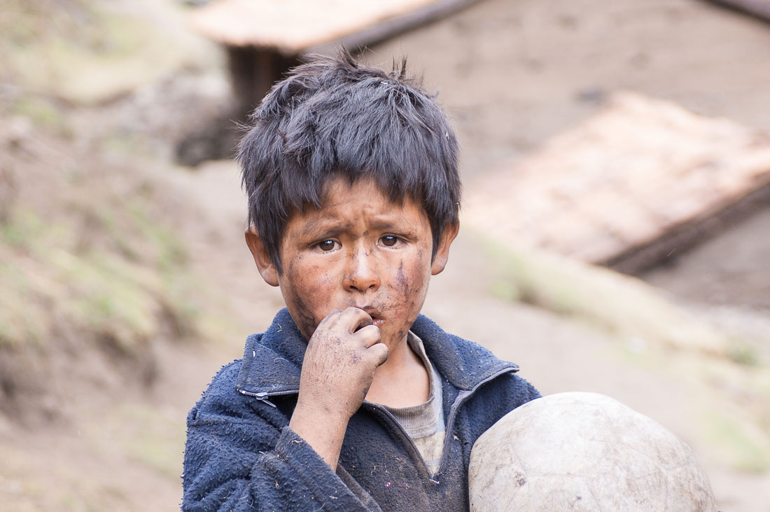 Child from the high elevation of the Cordillera Blanca, Peru, South America