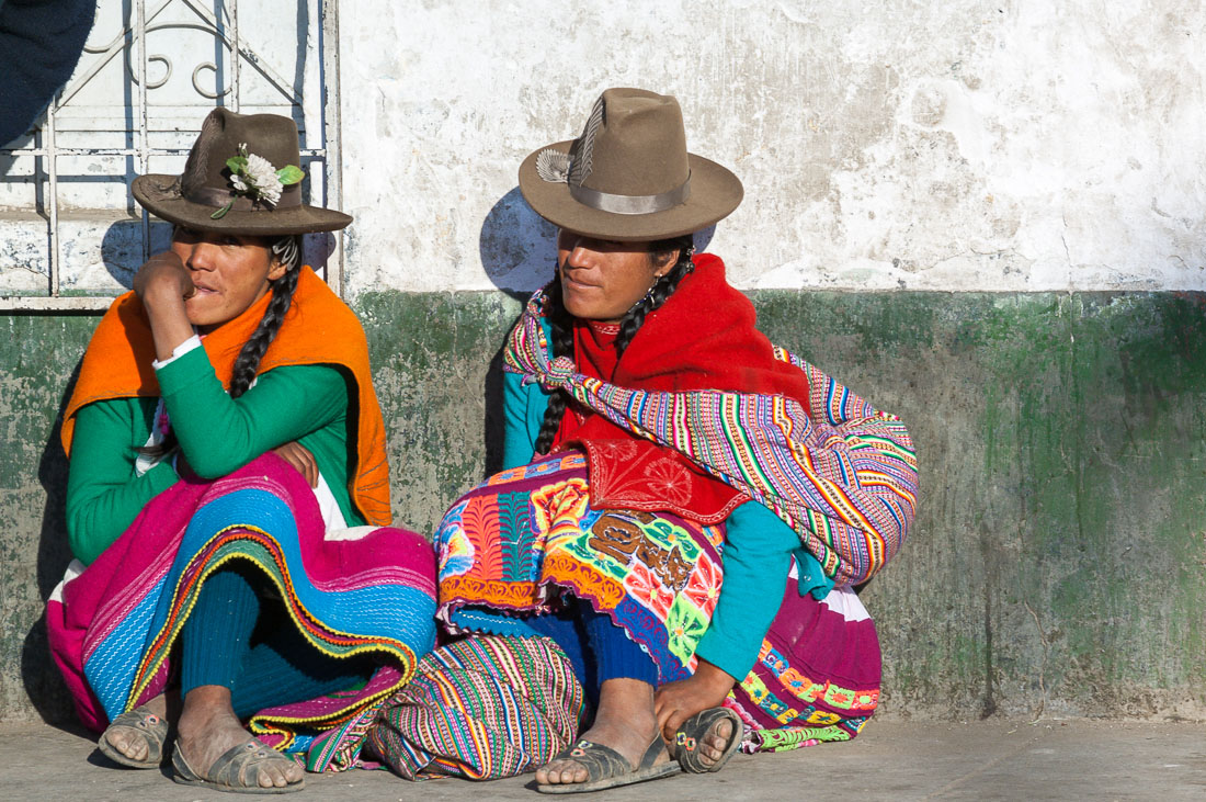 Women wearing traditional costume and hat, Huaraz, Peru, South America