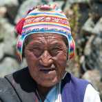 Old man wearing a traditional costume, isla Taquile, Lago Titicaca, Peru, South America