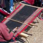 Women weaving at Cinchero wool artisan fair, Sacred Valley, Peru, South America