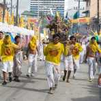 Followers of the Bang New Shrine carrying the statue of a deity, taking part in a street procession during the annual Chinese vegetarian festival. Phuket, Kingdom of Thailand, Indochina, South East Asia