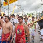 Psychic mediums followers of the Bang New Shrine, with chests covered by blood from self inflicted injuries on their faces, taking part in a street procession during the annual Chinese vegetarian festival. Phuket, Kingdom of Thailand, Indochina, South East Asia