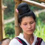 Woman from the Black Tai people ethnic minority with the traditional chignon hairdo, a detail showing she is married, Lai Chau province. Viet Nam, Indochina, South East Asia.