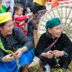 Mother and daughter from the Black Hmong people ethnic minority group, wearing traditional clothes. Dong Van market, Ha Gang province, Viet Nam, Indonesia, South East Asia