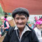 Old man from the Black Hmong people ethnic minority group, wearing the traditonal berret at Lung Pin market, Ha Giang province, Viet Nam, Indonesia, South East Asia