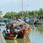 A typical river boat, now a floating bar serving fresh coffee and cold beers; Hoi An, Thu Bon river, Quang Nam province. Viet Nam, Indochina, South east Asia.