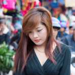 Very attractive young woman, a fine example of the Vietnamese beauty. Viet Nam, Indochina, South East Asia.