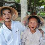 Together forever. This lovely old couple have been married for more than 60 years, both in their middle eighties, they look very happy. Hoi An, Quang Nam Province, Viet Nam, Indochina, South East Asia. Samsung smartphone.