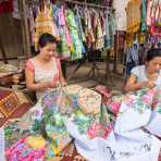 Two women working on a large embroidery, Phong Nha-Káº» BÃ ng, Quáº£ng BÃ¬nh province. Viet Nam, Indochina, South East Asia.