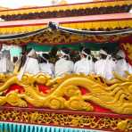 Family members sitting inside the hearse, during a traditional Vietnamese funeral. Hoi An, Quang Nam province, Viet Nam, Indochina, South East Asia.